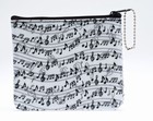 Music tote bags, totes, portfolios or anything you can carry with a music theme. Great gift item for your music teacher or family member. Get it for yourself as well to show the world you love music.